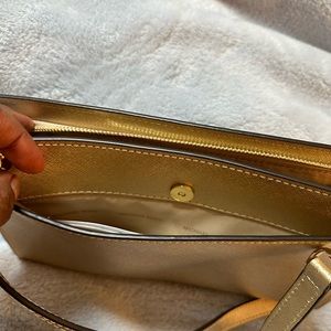 Michael Kors gold cross body bag